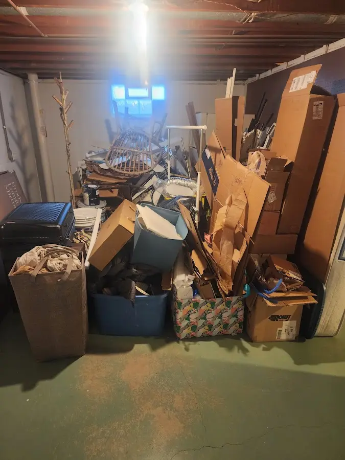 Roll-off dumpster container at job site for Roll Off Dumpster Rental in Milford